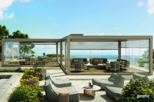 Pergola bioclimatique moderne avec lames orientables sur une terrasse élégante en Belgique